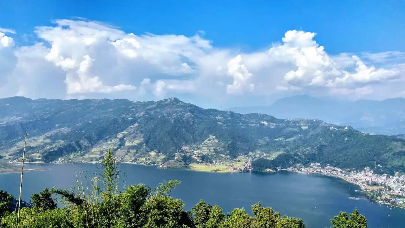 Phewa Lake surrounded by hills in Pokhara, Nepal